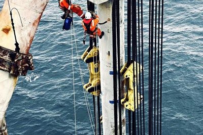 N-ERGISE Rope Access technicians working at height above the sea, with the headline Regional Presence, West Africa